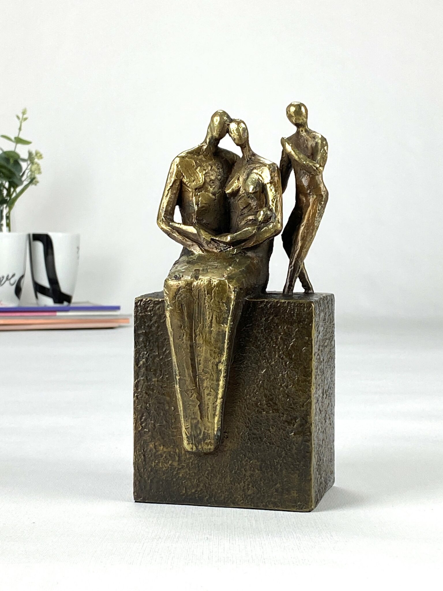 Min familie med 2 børn - ægte bronze